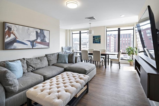 121 Portland St Unit 902, Boston, MA 02114 - living area with dark wood-style flooring