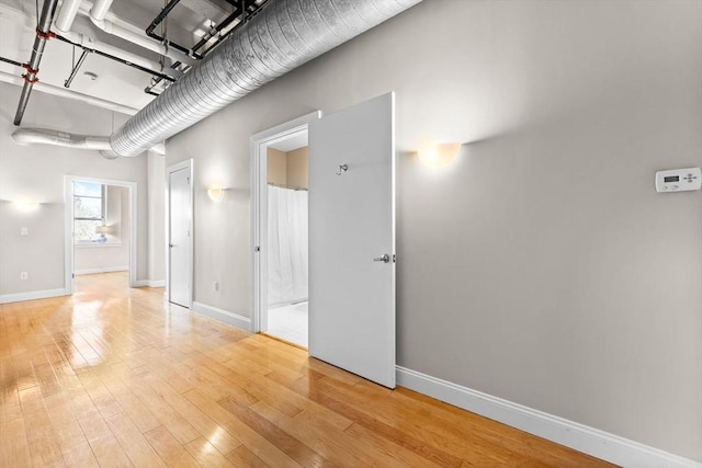 51 Lafayette St Unit 304, Salem, MA 01970 - unfurnished room with light wood-style floors and baseboards
