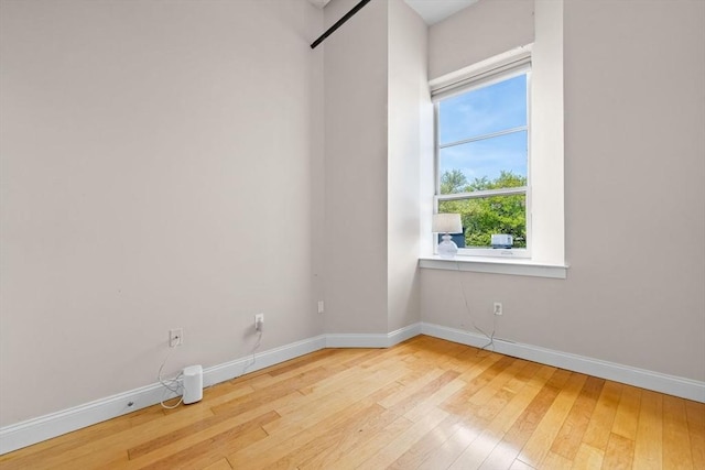 51 Lafayette St Unit 304, Salem, MA 01970 - empty room featuring hardwood / wood-style flooring and baseboards