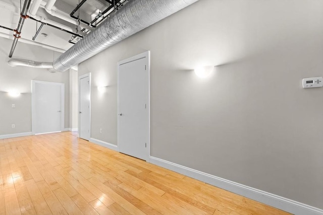 51 Lafayette St Unit 304, Salem, MA 01970 - unfurnished room featuring wood finished floors and baseboards