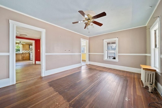 2 Eastern Ave, Hull, MA 02045 - spare room with a ceiling fan, hardwood / wood-style flooring, and ornamental molding
