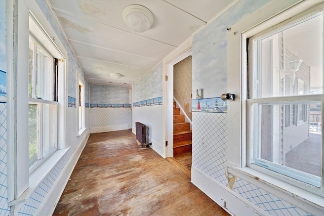 2 Eastern Ave, Hull, MA 02045 - hallway with wood finished floors, a wainscoted wall, and wallpapered walls