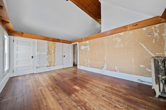 2 Eastern Ave, Hull, MA 02045 - unfurnished living room with hardwood / wood-style flooring and vaulted ceiling