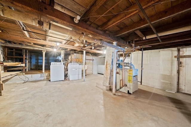 2 Eastern Ave, Hull, MA 02045 - unfinished basement with washer and dryer and a heating unit
