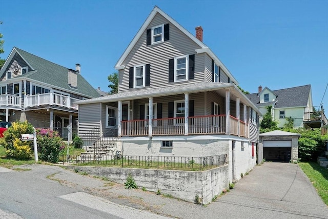 2 Eastern Ave, Hull, MA 02045 - farmhouse inspired home featuring covered porch, an outdoor structure, a chimney, driveway, and a garage