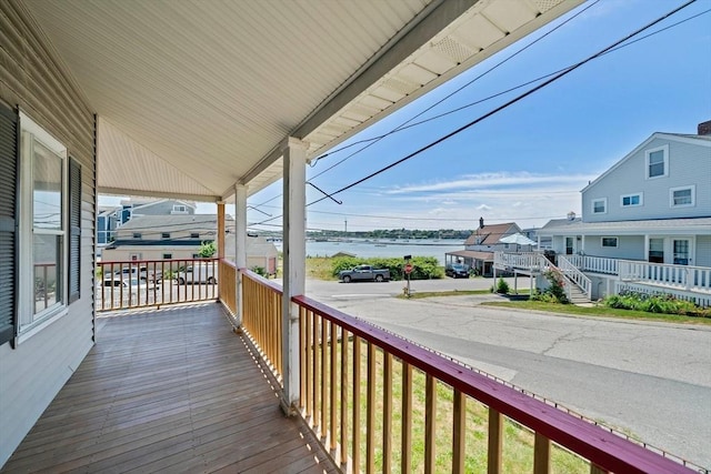 2 Eastern Ave, Hull, MA 02045 - wooden porch featuring a water view