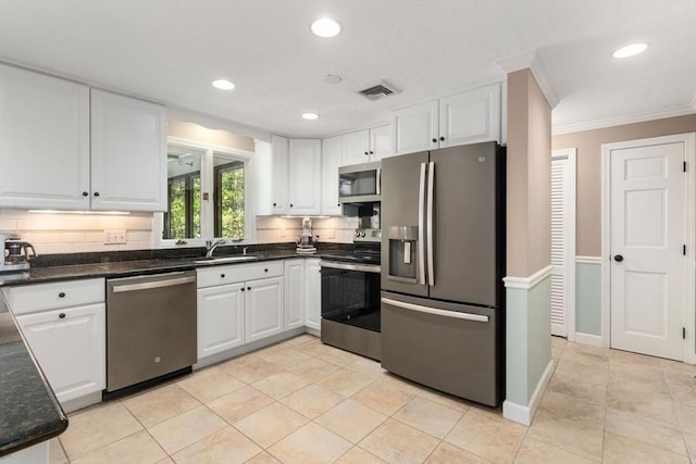 48 Pine Hill Dr, Walpole, MA 02081 - kitchen featuring stainless steel appliances, a sink, ornamental molding, white cabinetry, and tasteful backsplash