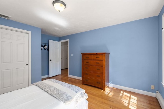 48 Pine Hill Dr, Walpole, MA 02081 - bedroom with light wood-type flooring and baseboards
