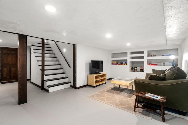 48 Pine Hill Dr, Walpole, MA 02081 - living room featuring finished concrete flooring, stairway, recessed lighting, and built in features