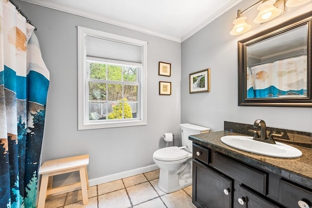bathroom featuring ornamental molding, baseboards, vanity, toilet, and tile patterned flooring