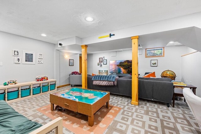 playroom featuring recessed lighting and light flooring