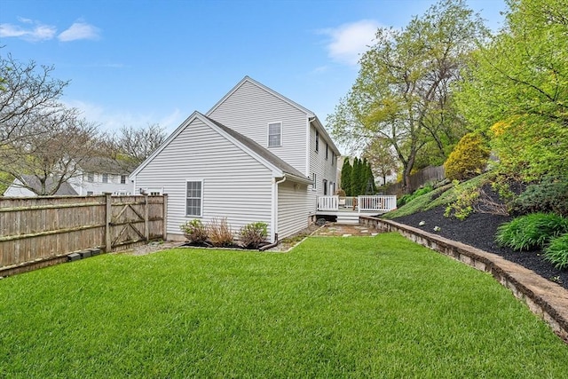 rear view of property with a deck