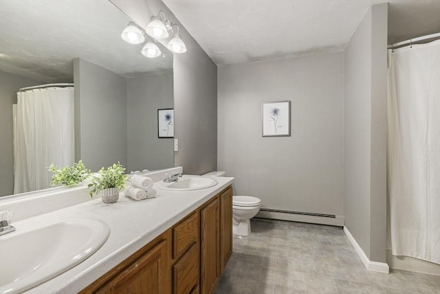 bathroom featuring curtained shower, a baseboard heating unit, vanity, and toilet