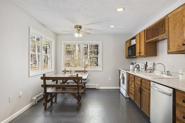 kitchen with a baseboard radiator, white electric range, sink, ceiling fan, and stainless steel dishwasher