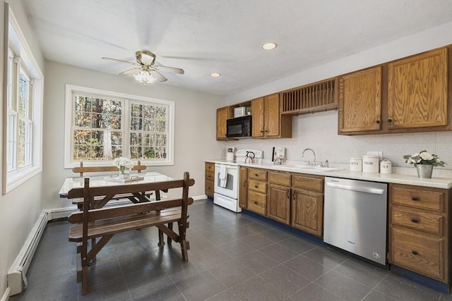 kitchen featuring baseboard heating, white electric stove, sink, ceiling fan, and stainless steel dishwasher