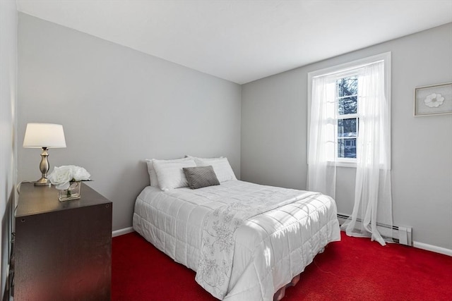 carpeted bedroom with a baseboard heating unit and multiple windows