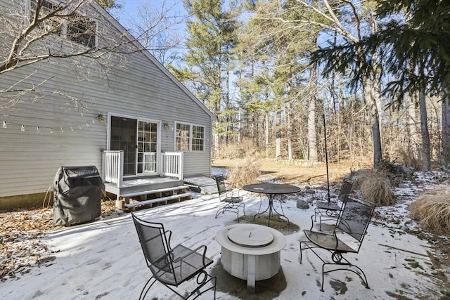 view of snow covered deck