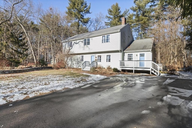 view of front of home with a deck