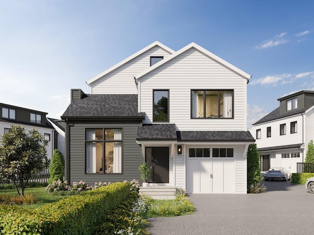19 Johnson Pl Unit 19, Newton, MA 02466 - view of front of house with an attached garage, driveway, and roof with shingles