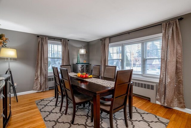 80 Andover, Peabody, MA 01960 - dining space featuring light wood finished floors, baseboards, and radiator