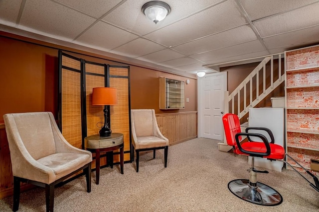 80 Andover, Peabody, MA 01960 - living area with stairway, carpet flooring, wooden walls, a wainscoted wall, and a drop ceiling