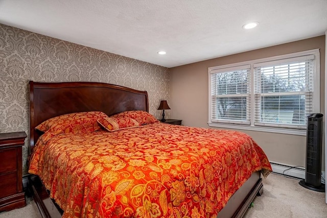 80 Andover, Peabody, MA 01960 - bedroom with wallpapered walls, a baseboard heating unit, carpet flooring, and recessed lighting