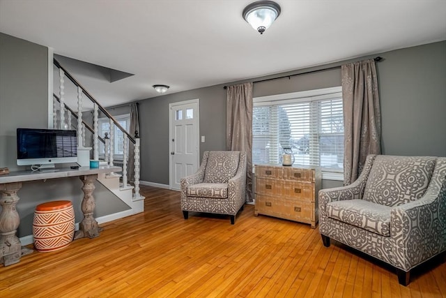 80 Andover, Peabody, MA 01960 - sitting room with plenty of natural light, stairway, and light wood finished floors