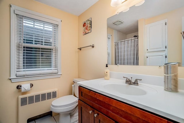 80 Andover, Peabody, MA 01960 - full bathroom with vanity, tile patterned flooring, a shower with curtain, toilet, and radiator