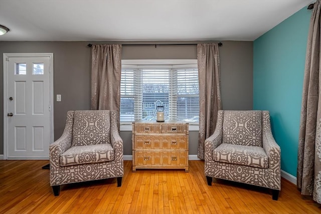 80 Andover, Peabody, MA 01960 - sitting room with a wealth of natural light, light wood-style floors, and baseboards