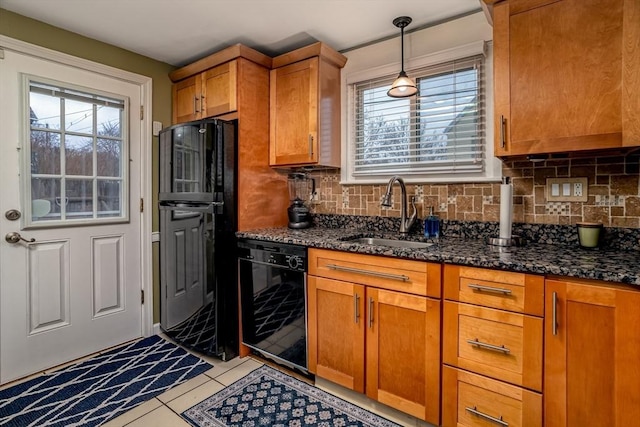 80 Andover, Peabody, MA 01960 - kitchen featuring a sink, brown cabinetry, a wealth of natural light, and black appliances