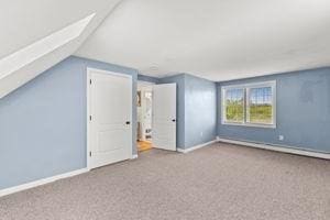 19 Station St, Wareham, MA 02571 - bonus room featuring carpet flooring, vaulted ceiling, baseboards, and a skylight