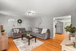 19 Station St, Wareham, MA 02571 - living area with light wood-type flooring