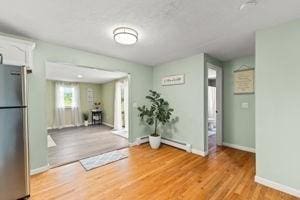 19 Station St, Wareham, MA 02571 - interior space featuring light wood-style flooring, baseboards, and a baseboard radiator