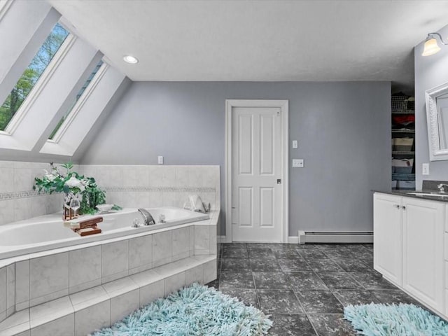 full bathroom with a baseboard radiator, a bath, vanity, and a skylight