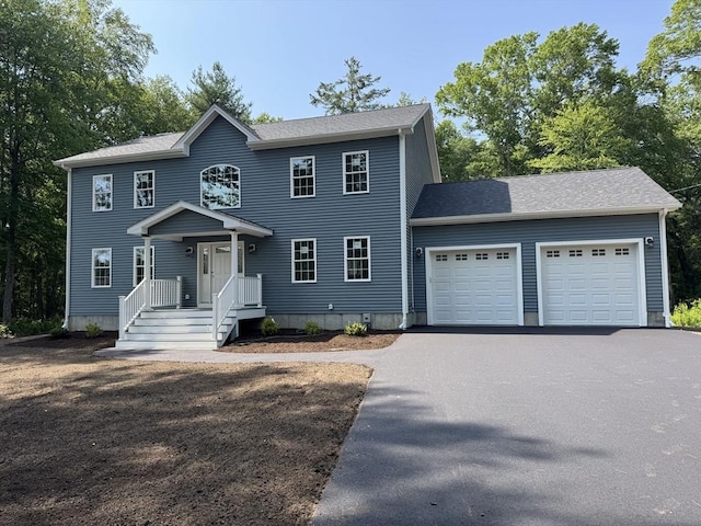 1269 Bartlett St, New Bedford, MA 02745 - colonial inspired home with driveway and a garage