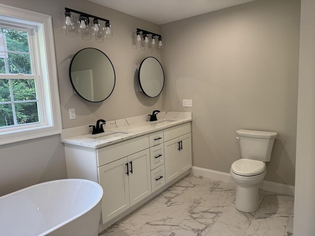 1269 Bartlett St, New Bedford, MA 02745 - bathroom featuring marble look tile flooring, a soaking tub, double vanity, and healthy amount of natural light