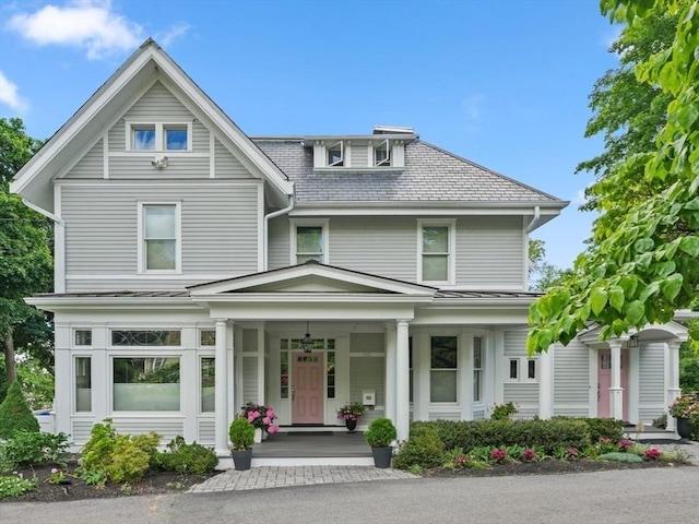 view of front of property featuring covered porch