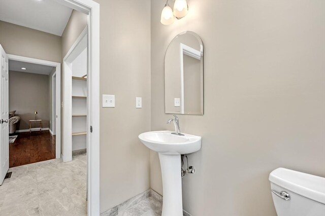 233A Green St, Boylston, MA 01505 - bathroom featuring toilet and baseboards