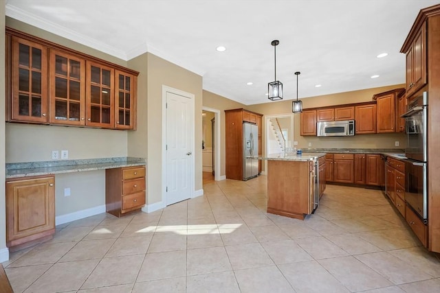 kitchen featuring brown cabinetry, recessed lighting, built in desk, appliances with stainless steel finishes, and crown molding