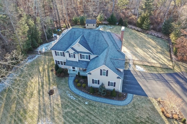 aerial view featuring a view of trees