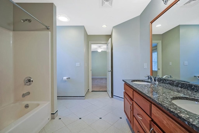 bathroom with tile patterned flooring, visible vents, bathtub / shower combination, and a sink