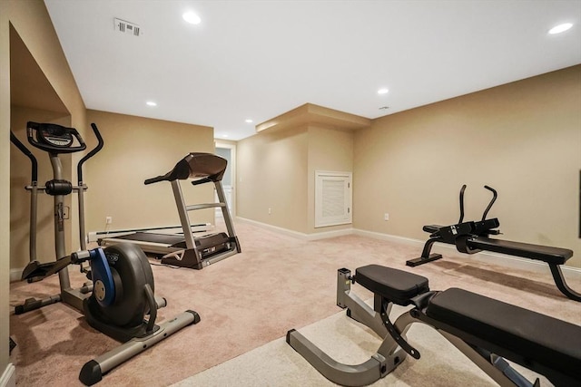 exercise area featuring visible vents, recessed lighting, carpet flooring, and baseboards