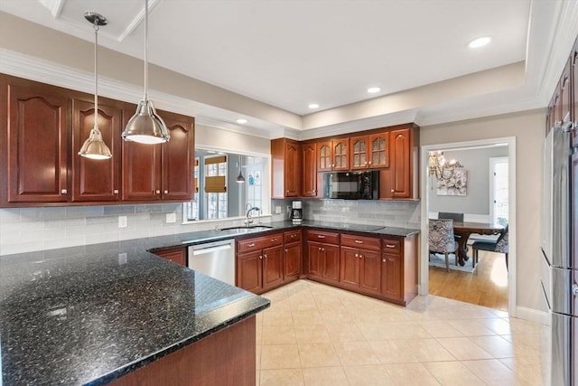 267 W St, Northborough, MA 01532 - kitchen with a sink, stainless steel dishwasher, light tile patterned floors, hanging light fixtures, and backsplash