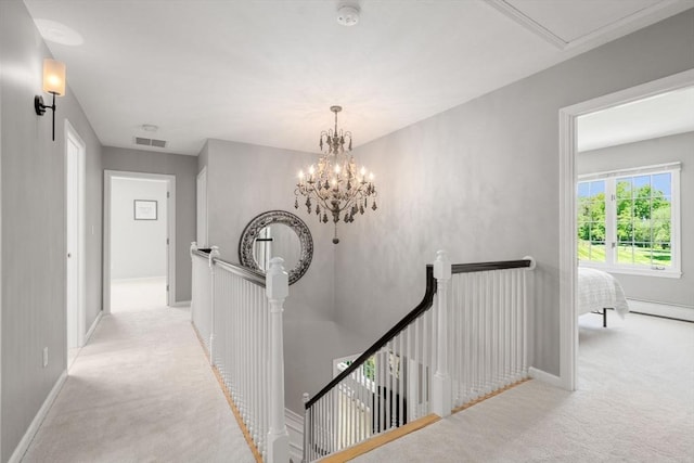 267 W St, Northborough, MA 01532 - hallway featuring an upstairs landing, carpet, and baseboards