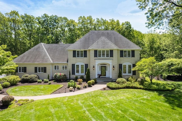 267 W St, Northborough, MA 01532 - colonial house with a front yard and roof with shingles