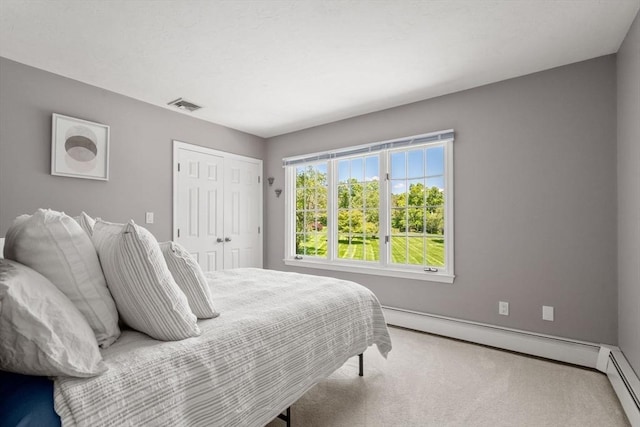 267 W St, Northborough, MA 01532 - bedroom featuring carpet flooring, baseboards, a closet, and a baseboard radiator