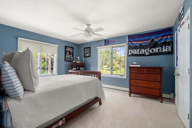 267 W St, Northborough, MA 01532 - bedroom with a baseboard radiator, carpet floors, ceiling fan, and baseboards