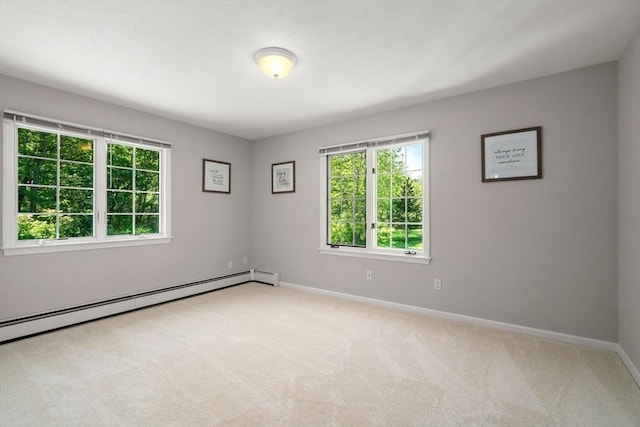 267 W St, Northborough, MA 01532 - carpeted empty room featuring baseboards and a baseboard radiator