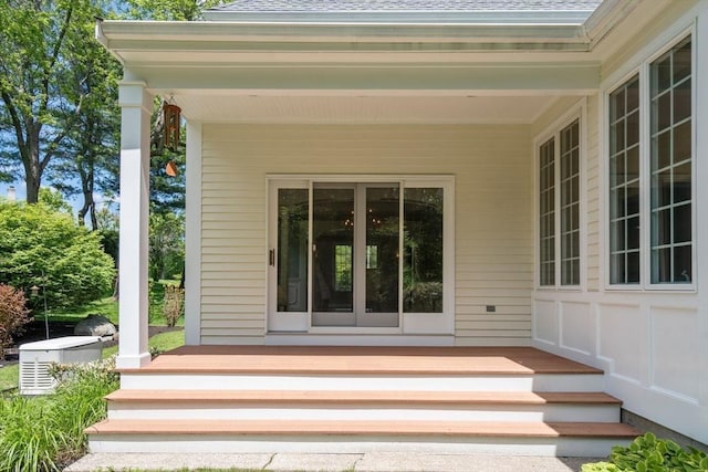 267 W St, Northborough, MA 01532 - view of exterior entry featuring a porch and roof with shingles