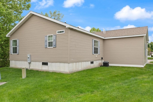 18 Skyview Dr, Brockton, MA 02301 - view of side of property featuring a yard and central air condition unit